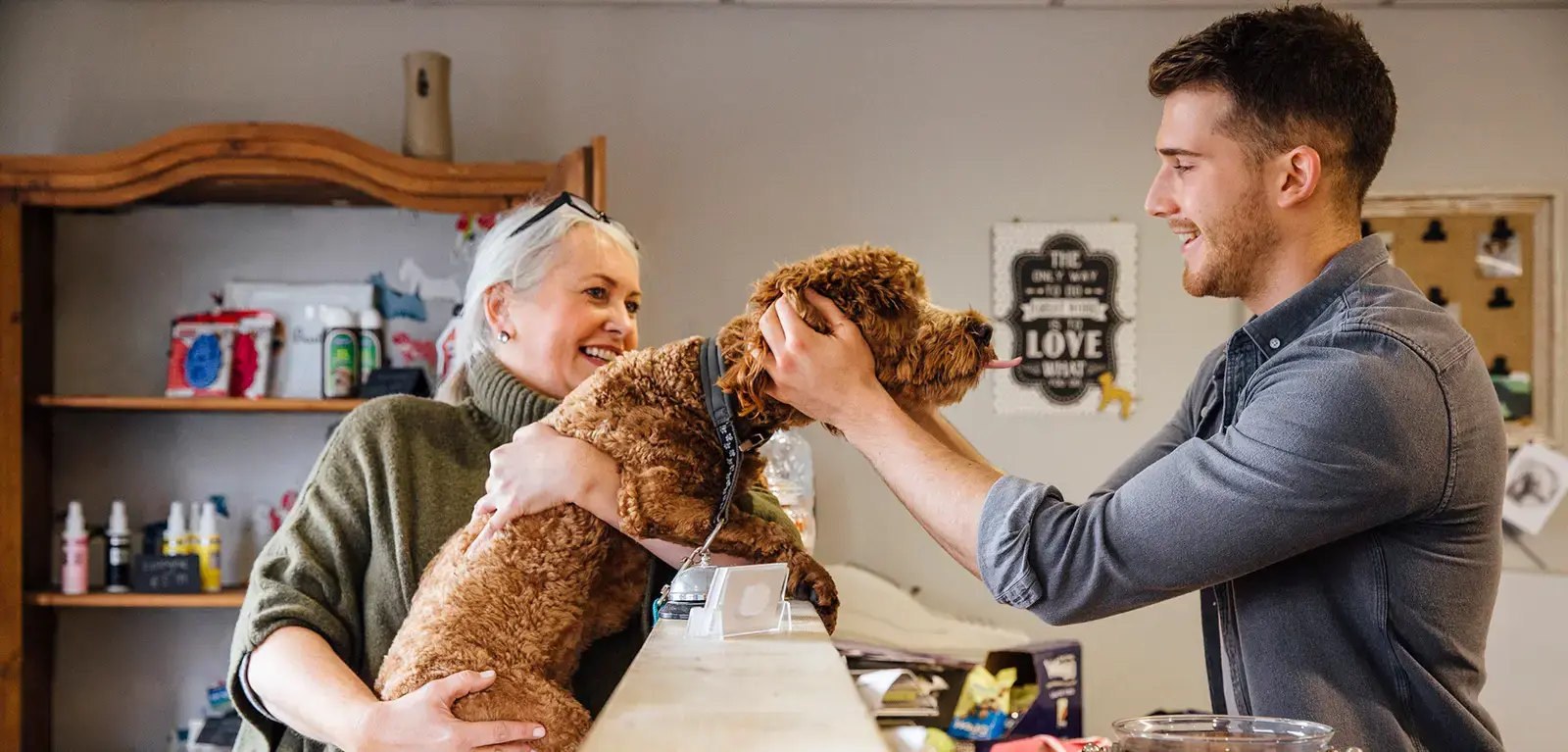 Man petting dog Man petting dog