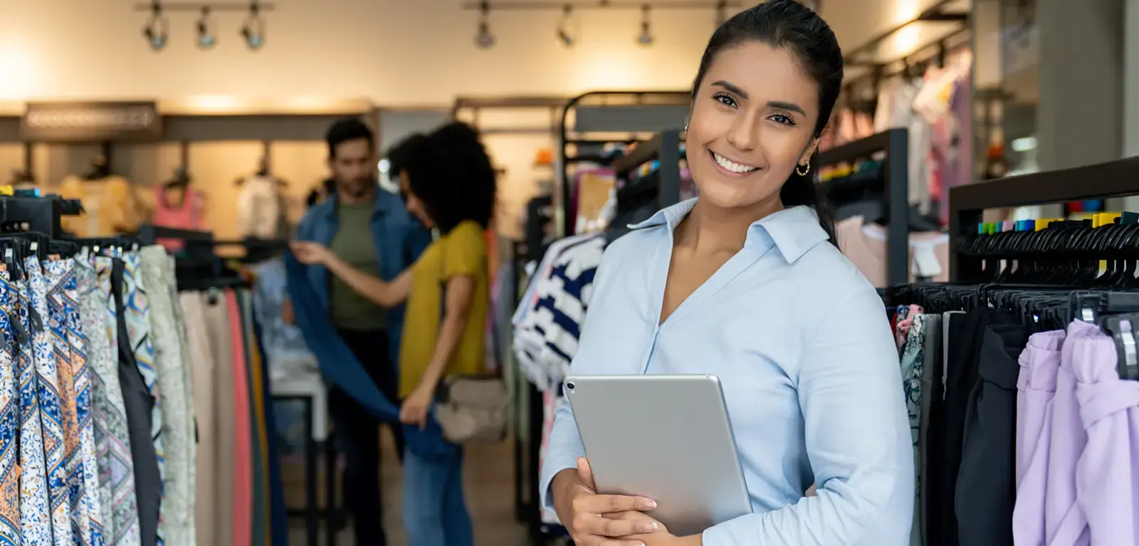 Retail worker holding a tablet Retail worker holding a tablet
